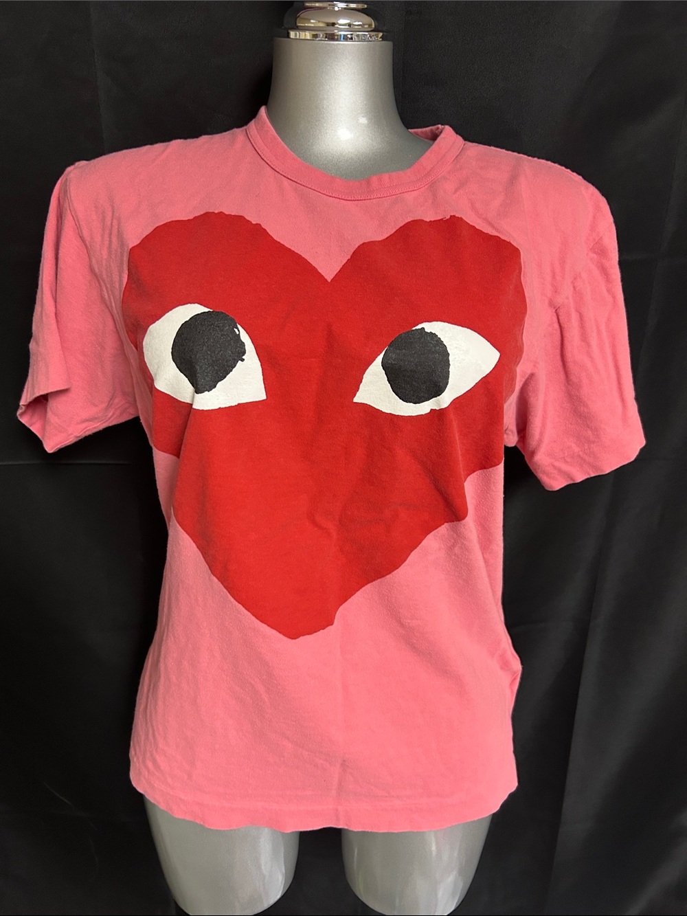 Comme des Garcons Pink Tee with Red Heart Eye Graphic